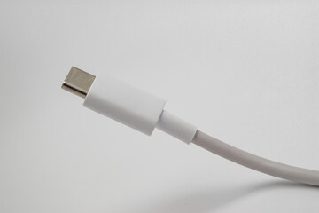 close up white usb cable with connector on white background