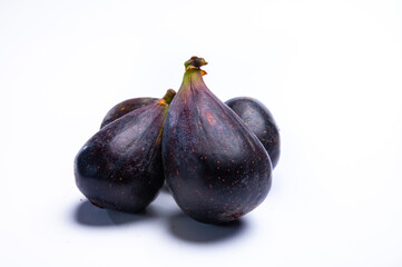 Fresh ripe organic figs fruits ready to eat close up isolated on white background