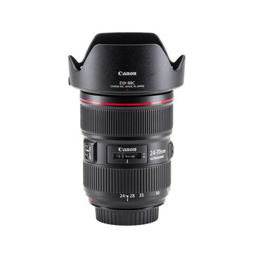 Canon EF 24-70mm f/2.8L II USM Professional zoom lens for DSLR digital camera isolated on a transparent background, PNG. High resolution.