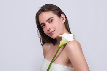 Beauty girl with calla lily. Beautiful sensual woman hold flowers, studio portrait.
