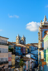 Colorful streets, houses, slopes and church in the historic district of Pelourinho in the city of...