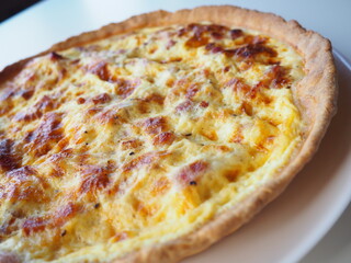 Homemade traditional french Quiche Lorraine, real recipe, white background