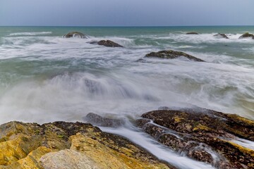scenic view over the popular Beach Sri Lanka with stormy sea