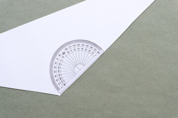 mathematical set instrument - protractor on cut paper