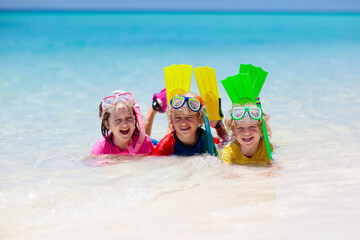 Kids snorkel. Children snorkeling in tropical sea. - obrazy, fototapety, plakaty