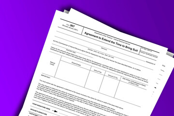 Form 907 documentation published IRS USA 07.17.2012. American tax document on colored