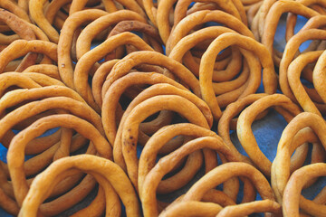 Traditional greek sesame bread rings snack pastry, Koulouri Thessalonikis with different flavours...