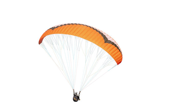 The sportsman flying on a paraglider. isolated on transparent background with clipping path. Beautiful paraglider in flight  with clipping path and alpha channel. for both printing and web pages. 