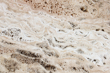 Brown stone with cracks on the surface