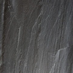 Dark grey black slate background or texture.