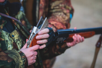 A process of hunting during spring hunting season, process of duck hunting, group of hunters in...