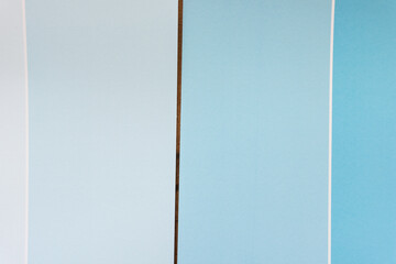 two paper pad sheets in blue with paint-chip design - macro lens, particular focus 