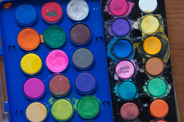 two watercolor paint pucks sets