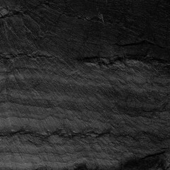 Dark grey black slate background or texture.