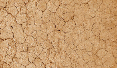 Cracked ground background in the top view for graphic design or wallpaper - Powered by Adobe
