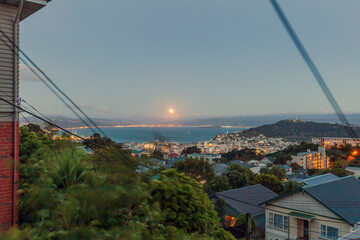Full moon over Wellington city, New Zealand