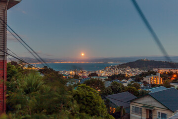 Full moon over Wellington city, New Zealand