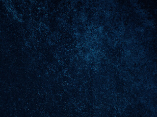 Dark rough cement wall background for graphic design or wallpaper.