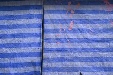 blue stripe dirty plastic texture background for construction industry area