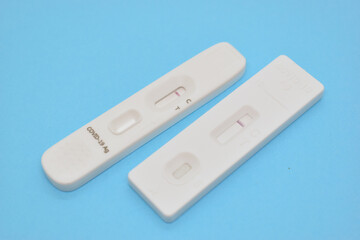 covid test kid on blue background