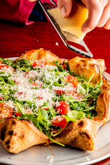 Pizza. Cheese Pizza. Traditional New York City style margarita pizza pie with a thin homemade crispy crust, tomato, garlic, marinara sauce topped with buffalo mozzarella cheese and fresh basil leaves.
