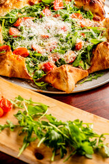 Pizza. Cheese Pizza. Traditional New York City style margarita pizza pie with a thin homemade crispy crust, tomato, garlic, marinara sauce topped with buffalo mozzarella cheese and fresh basil leaves.