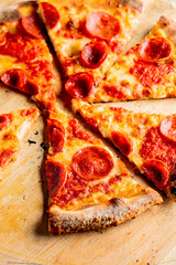 Pizza. Cheese Pizza. Traditional New York City style margarita pizza pie with a thin homemade crispy crust, tomato, garlic, marinara sauce topped with buffalo mozzarella cheese and fresh basil leaves.