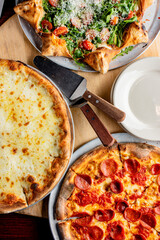 Pizza. Cheese Pizza. Traditional New York City style margarita pizza pie with a thin homemade crispy crust, tomato, garlic, marinara sauce topped with buffalo mozzarella cheese and fresh basil leaves.