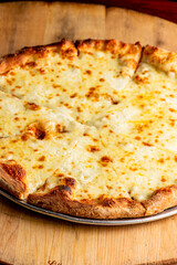 Pizza. Cheese Pizza. Traditional New York City style margarita pizza pie with a thin homemade crispy crust, tomato, garlic, marinara sauce topped with buffalo mozzarella cheese and fresh basil leaves.