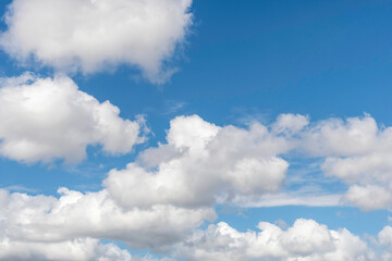 Naklejka na ściany i meble Soft white cloud cover in the blue sky