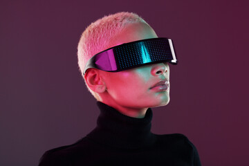 Vr glasses, woman and metaverse for futuristic gaming, digital transformation and tech. Cyberpunk person face on studio background with virtual or augmented reality headset for 3d and cyber world ux