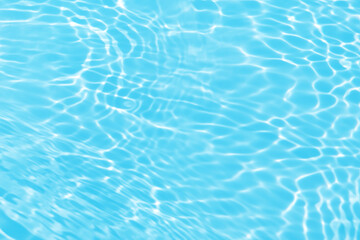 Bluewater waves on the surface ripples blurred. Defocus blurred transparent blue colored clear calm water surface texture with splash and bubbles. Water waves with shining pattern texture background.