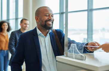 Counter, ticket and black man in airport for passport check or in hotel line for travel service. Happy customer person at security booth or glass window for business booking and buying pass at seller