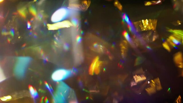 Black Background With Lens Flare On Falling Confetti