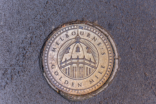 Melbourne's Golden Mile pavement marker disc, Melbourne's Golden Mile starts at the Immigration Museum in Flinders Street and ends at the Royal Exhibition Building and the new Melbourne Museum