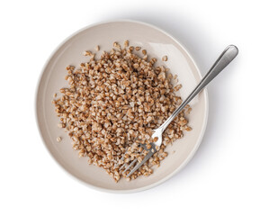 Plate of tasty buckwheat porridge isolated on white background