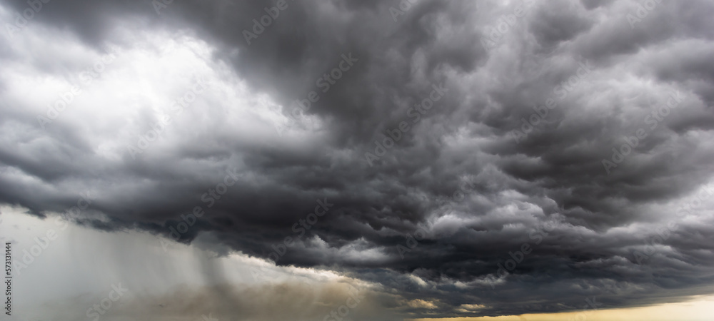 Aufkleber The dark sky with heavy clouds converging and a violent storm before the rain.Bad or moody weather sky and environment. carbon dioxide emissions, greenhouse effect, global warming, climate change