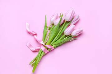Bouquet of beautiful tulips on pink background. Women's Day celebration