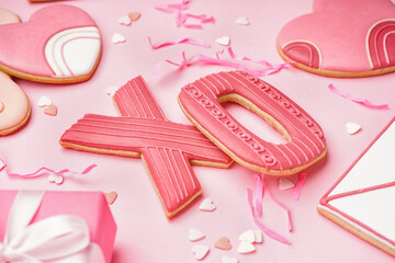 Tasty cookies and colorful sprinkles on pink background, closeup. Valentine's Day celebration