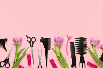Hairdresser's tools with tulips on pink background. Hello spring