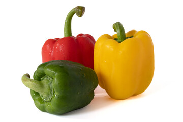 Sweet bell pepper (red,green and yellow) with water drops isolated on white background.
