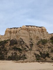 Fototapeta na wymiar texture of Half Moon Bay rocks, cliffs