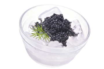 Black caviar in a glass bowl isolated