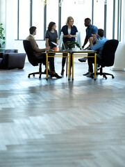 Coaching, support and teamwork with business people in meeting with floor mockup for goal, idea or...