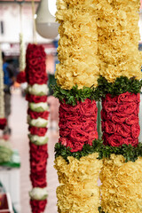 flower garland in the market.
Indian traditional culture colorful garland - 573145657