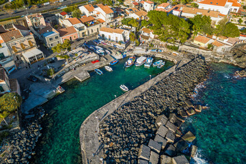 Fototapeta na wymiar Aerial view of San Giovanni li Cuti seaside neighborhood in Catania, Sicily, with small harbor