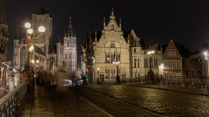 Fototapeta na wymiar Beautiful Belgian architecture at night in Gent, Belgium in January 2023