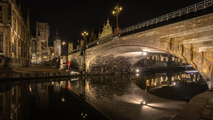 Beautiful reflections of water at night in Gent, Belgium in January 2023