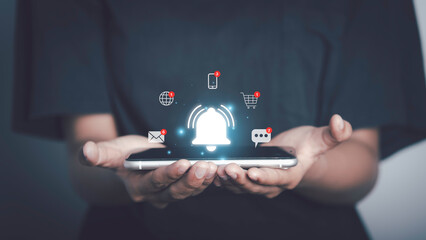 Man using smartphone with bell ringing application notification alert concept. New message, reminder, alarm ,Mail inbox, contact, New product marketing alert.