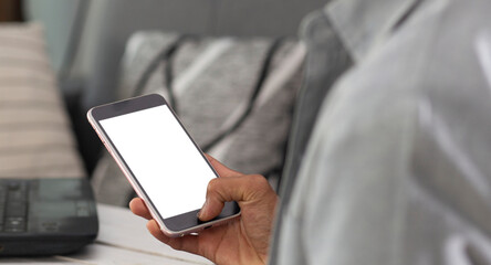 smartphone with transparent screen and man hand holding and using,PNG file design on smartphone